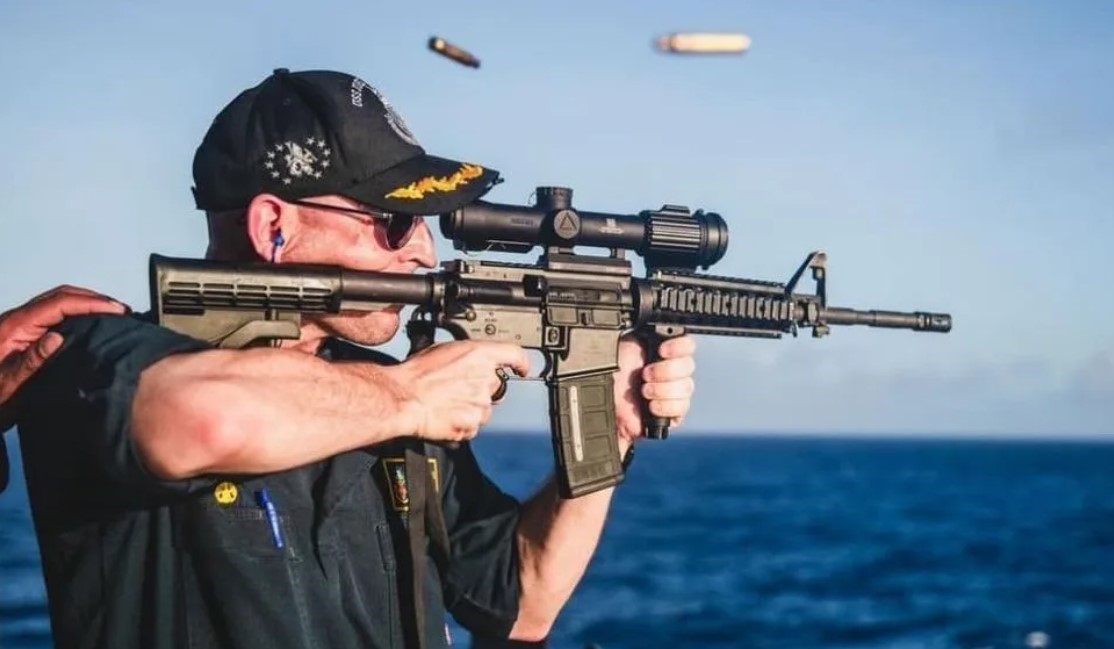 Navy Skewered For Posting Picture Of Ship Commander Mishandling Rifle, Using Backwards Scope