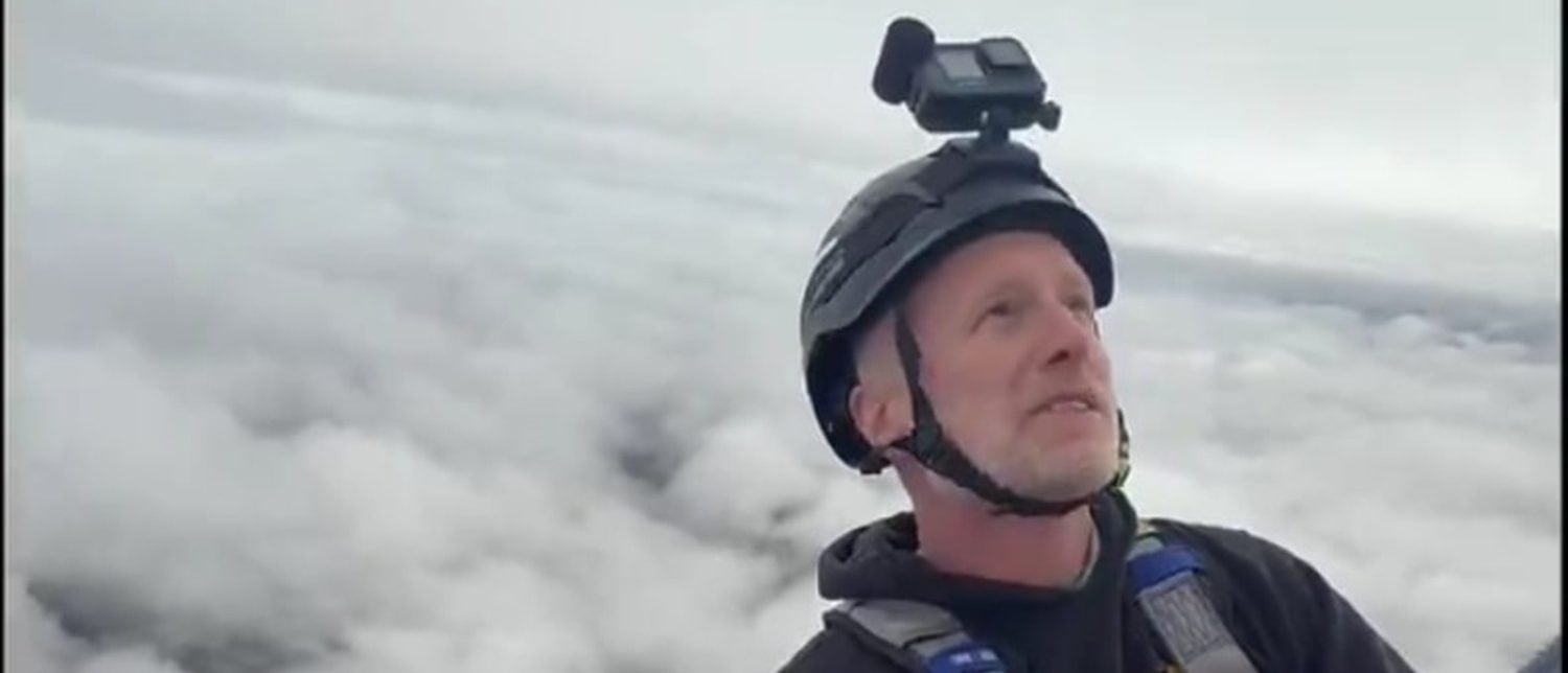 Brendan Carr Climbs Above The Clouds To Celebrate One Of Scariest, Hardest Jobs In World