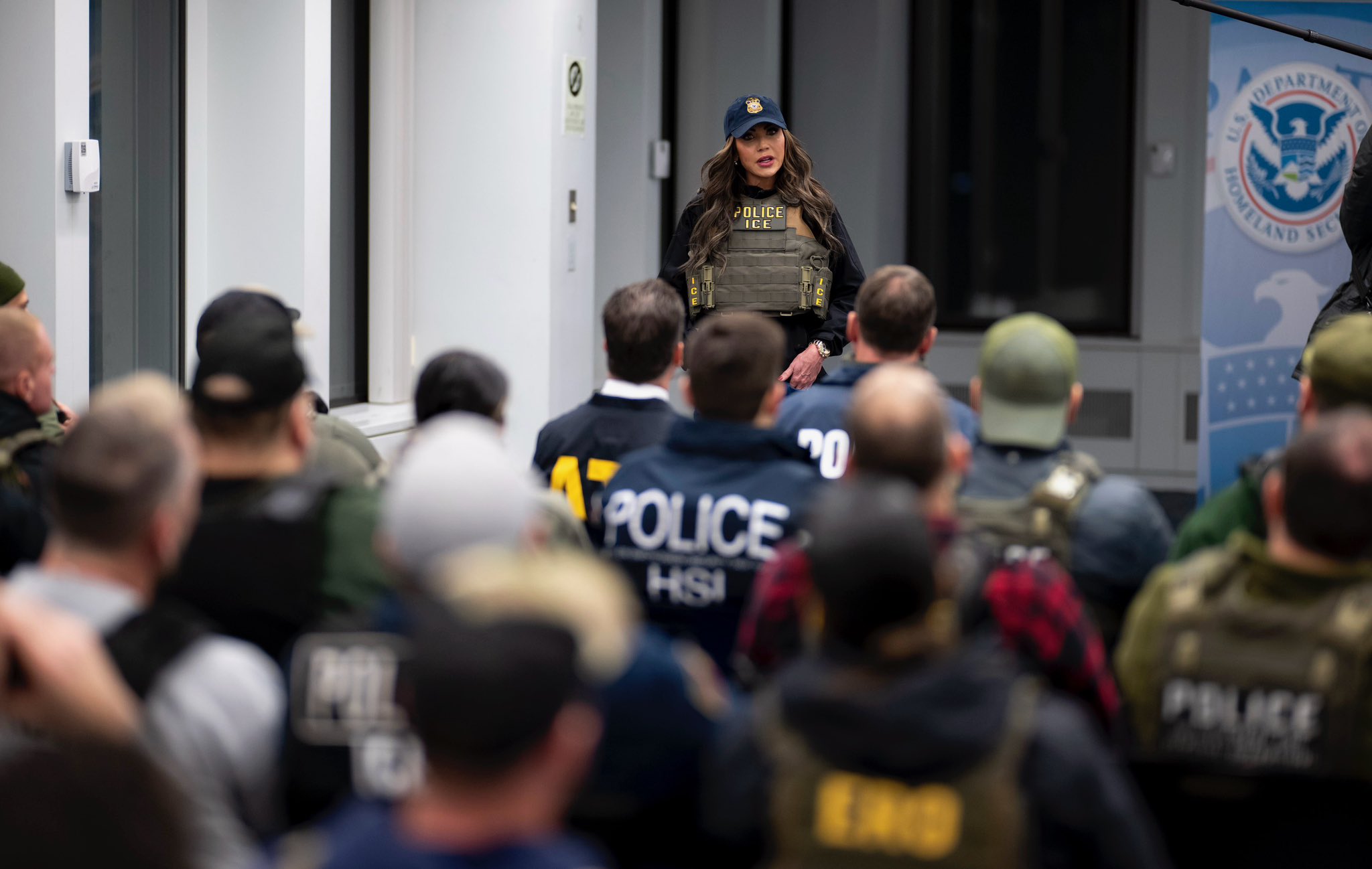 Kristi Noem's caption in X: "Arresting some criminal aliens this morning in NYC - thank you to the brave officers involved". (Public photo by the Department of Homeland Security)