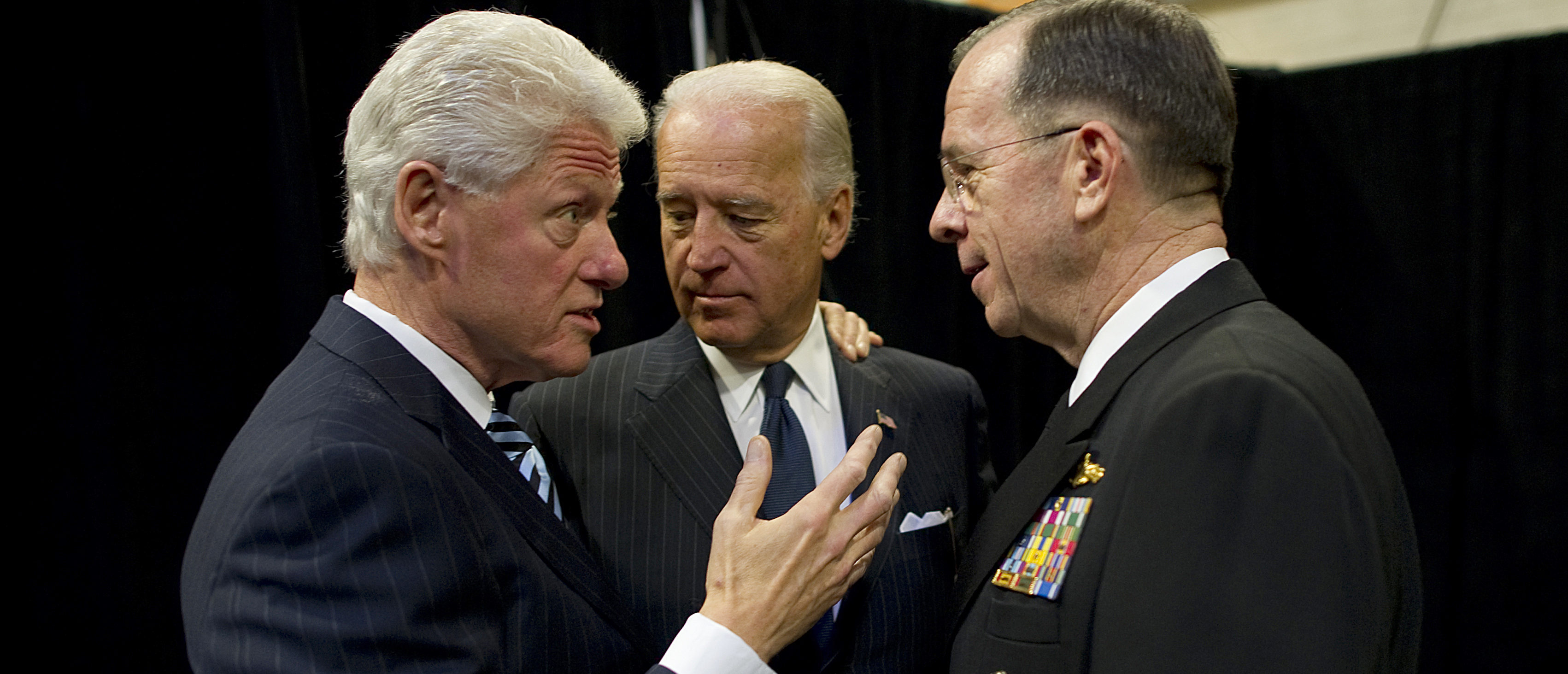 President Bill Clinton, Vice-President Joe Biden and U.S. Navy Adm. Mike Mullen, chairman of the Joint Chiefs of Staff speak backstage at the memorial service for Ambassador Richard C. Holbrooke at the John F. Kennedy Center for Performing Arts in Washington, D.C. on Jan. 14, 2011. Holbrooke, the Special Envoy to Afghanistan and Pakistan, died in December 2010 after a nearly 50 year career in foreign service. (DoD photo by Mass Communication Specialist 1st Class Chad J. McNeeley/Released)